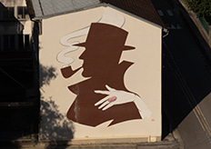 Fresque murale représentant un fumeur de pipe